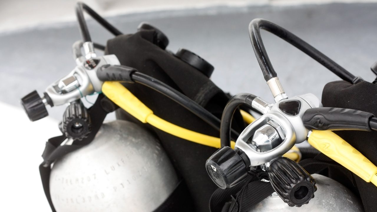 Rinsing scuba equipment in fresh water